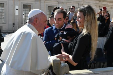 Samantha Hoopes and her family getting blessings from Pope Frances.
